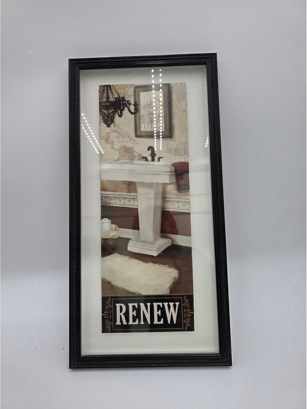 Framed Wall Art Print Featuring Pedestal Sink and 'RENEW' Text